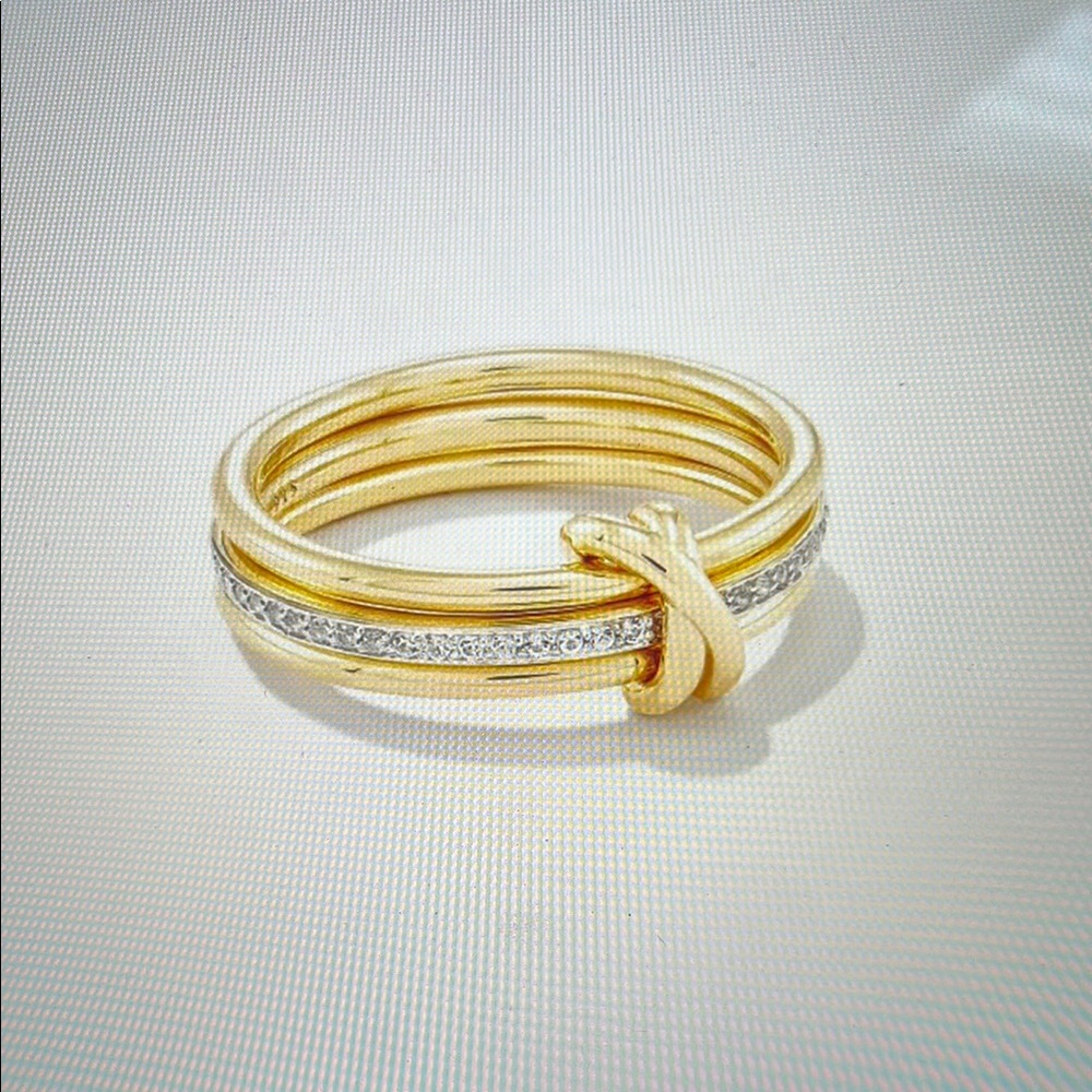 Contemporary Gold and Silver Interlocking Ring with Diamonds